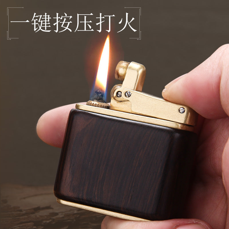 Creative press type kerosene lighter pure copper old-fashioned retro personalized solid wood arm covering kowtow machine nostalgic grinding wheel